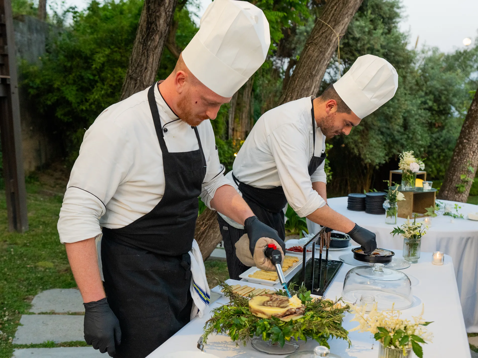 Chefs preparing an outdoor catering event
