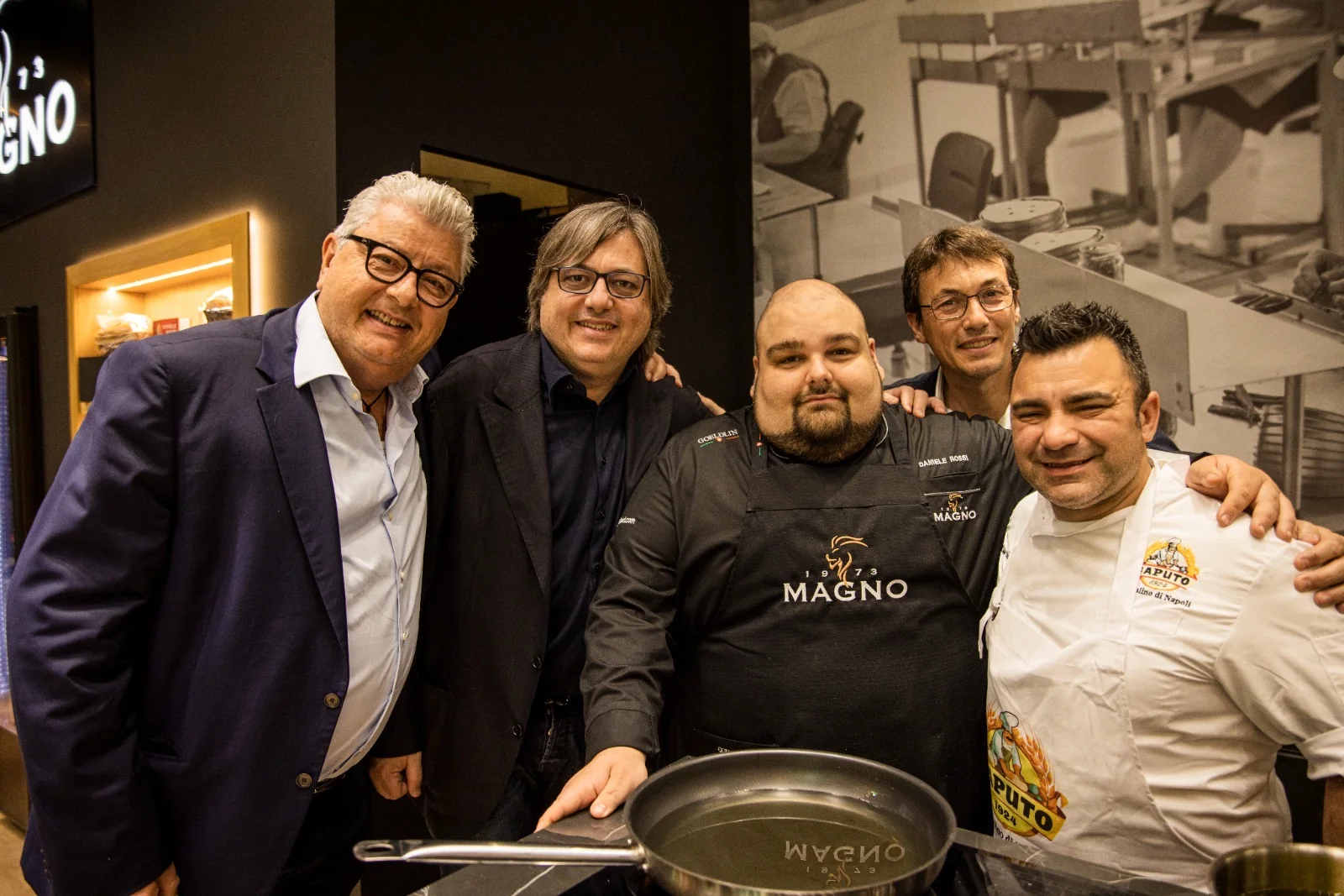 Mauro Magno with chefs at an event
