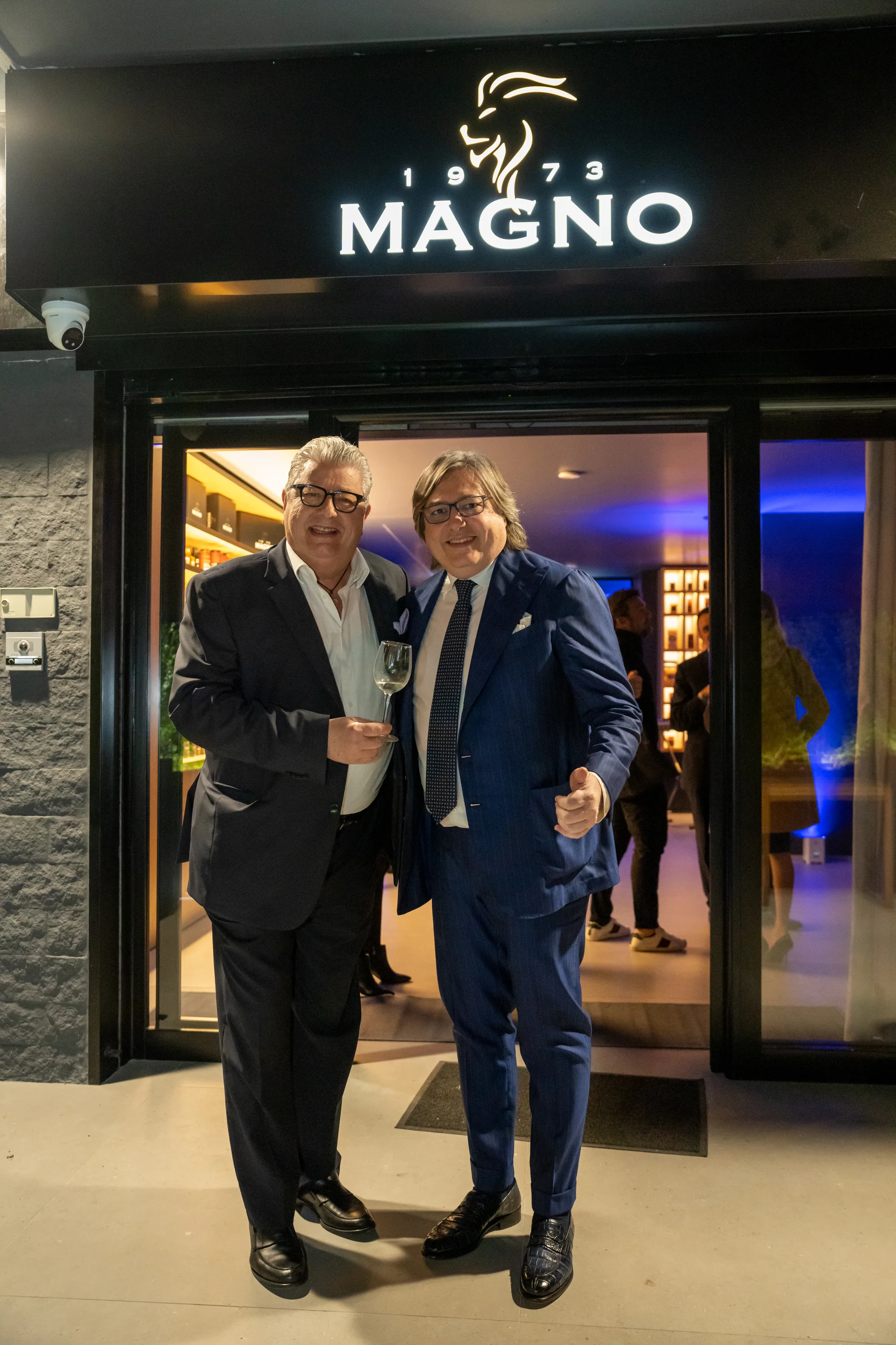 Antonino Restino and Mauro Magno outside the Magno showroom